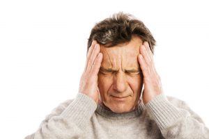 Man Suffering from Headache or Vertigo